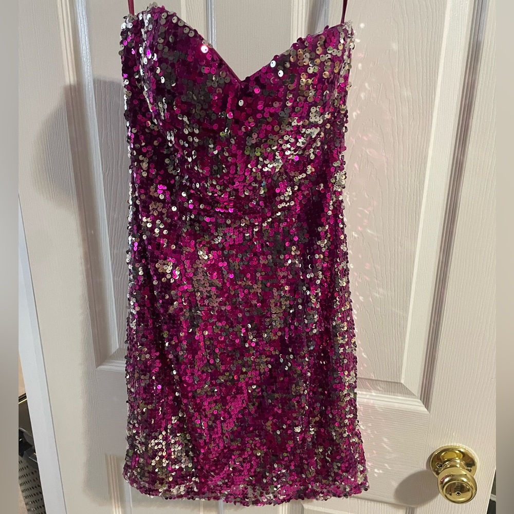 Strapless mini homecoming dress. Worn once. May have missing sequins due to wear